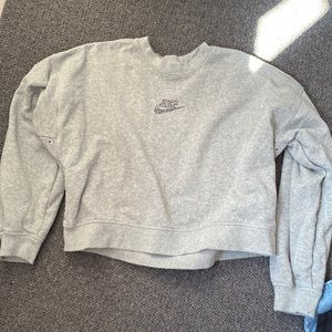 Grey Nike sweatshirt